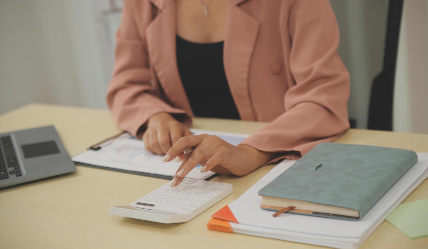 Business Documents, Auditor businesswoman checking searching document legal prepare paperwork or report for analysis TAX time,accountant Documents data contract partner deal in workplace office photo