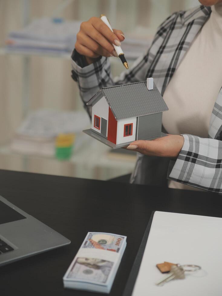 buy or sell real estate mortgage, Sale representative offer house purchase contract to buy a house or apartment and mortgage Money and Financial Concepts photo