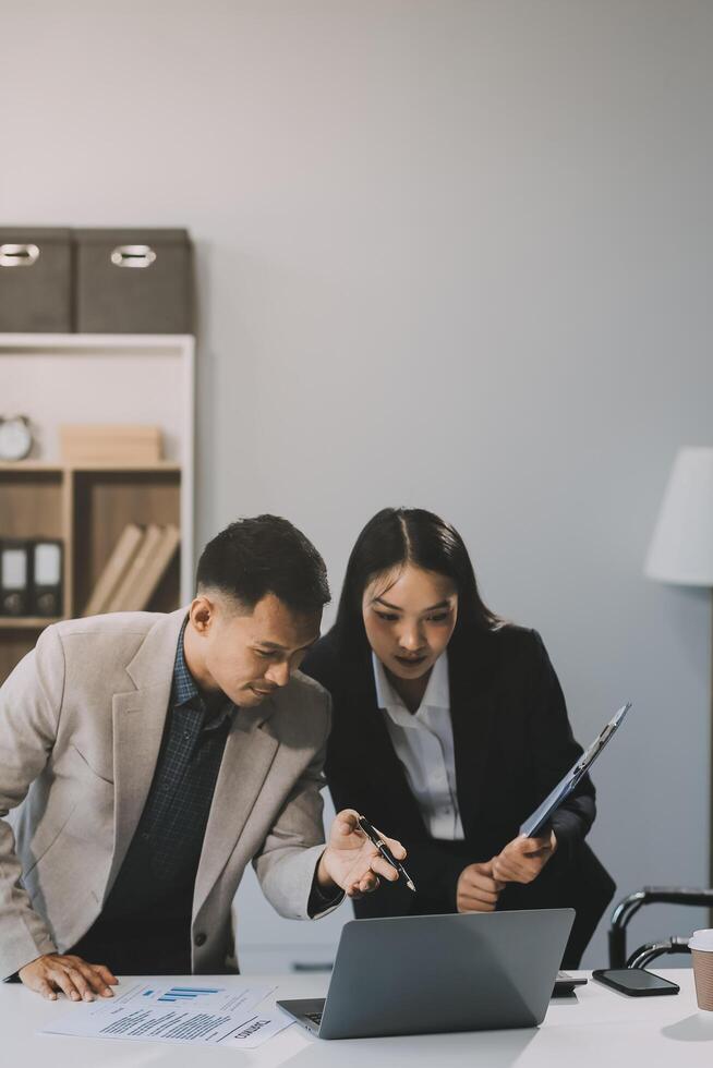 Two happy friendly diverse professionals, teacher and student giving high five standing in office celebrating success, good cooperation result, partnership teamwork and team motivation in office work. photo