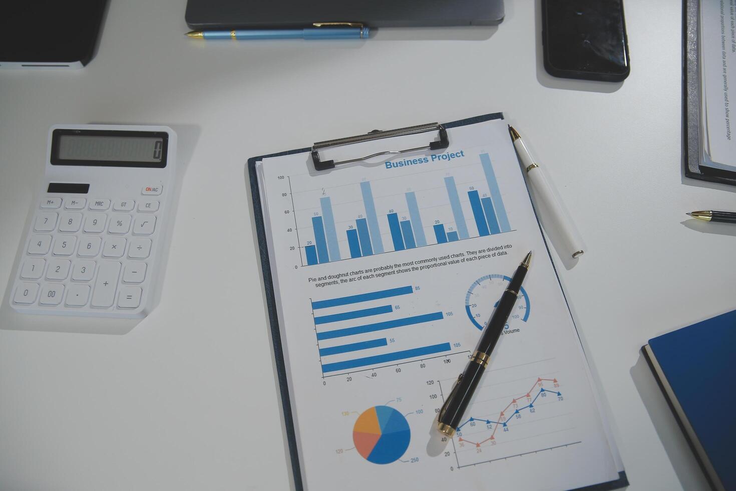 Business team collaboration discussing working analyzing with financial data and marketing growth report graph in team, presentation and brainstorming to strategy planning making profit of company. photo