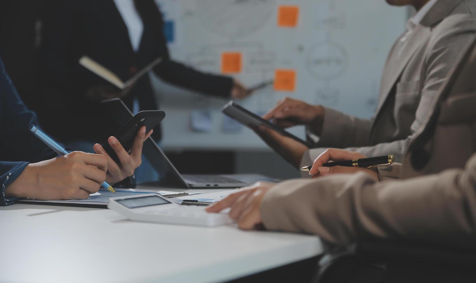 Business team collaboration discussing working analyzing with financial data and marketing growth report graph in team, presentation and brainstorming to strategy planning making profit of company. photo