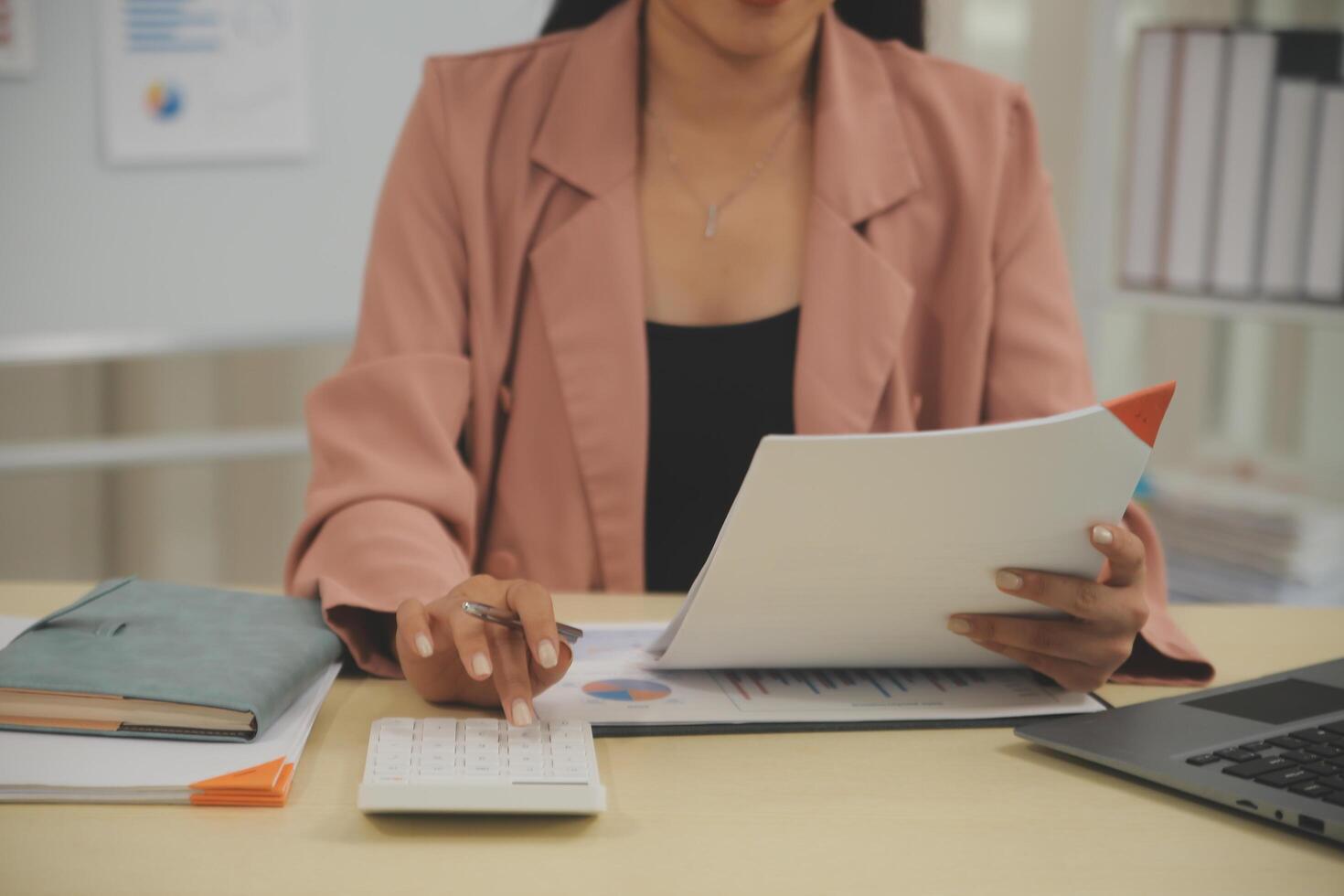 Business Documents, Auditor businesswoman checking searching document legal prepare paperwork or report for analysis TAX time,accountant Documents data contract partner deal in workplace office photo
