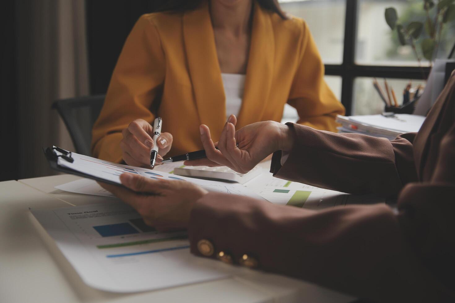 Team of business people working together in the meeting room office, teamwork background charts and graphs banner, double exposure successful teamwork,business planning concept. photo