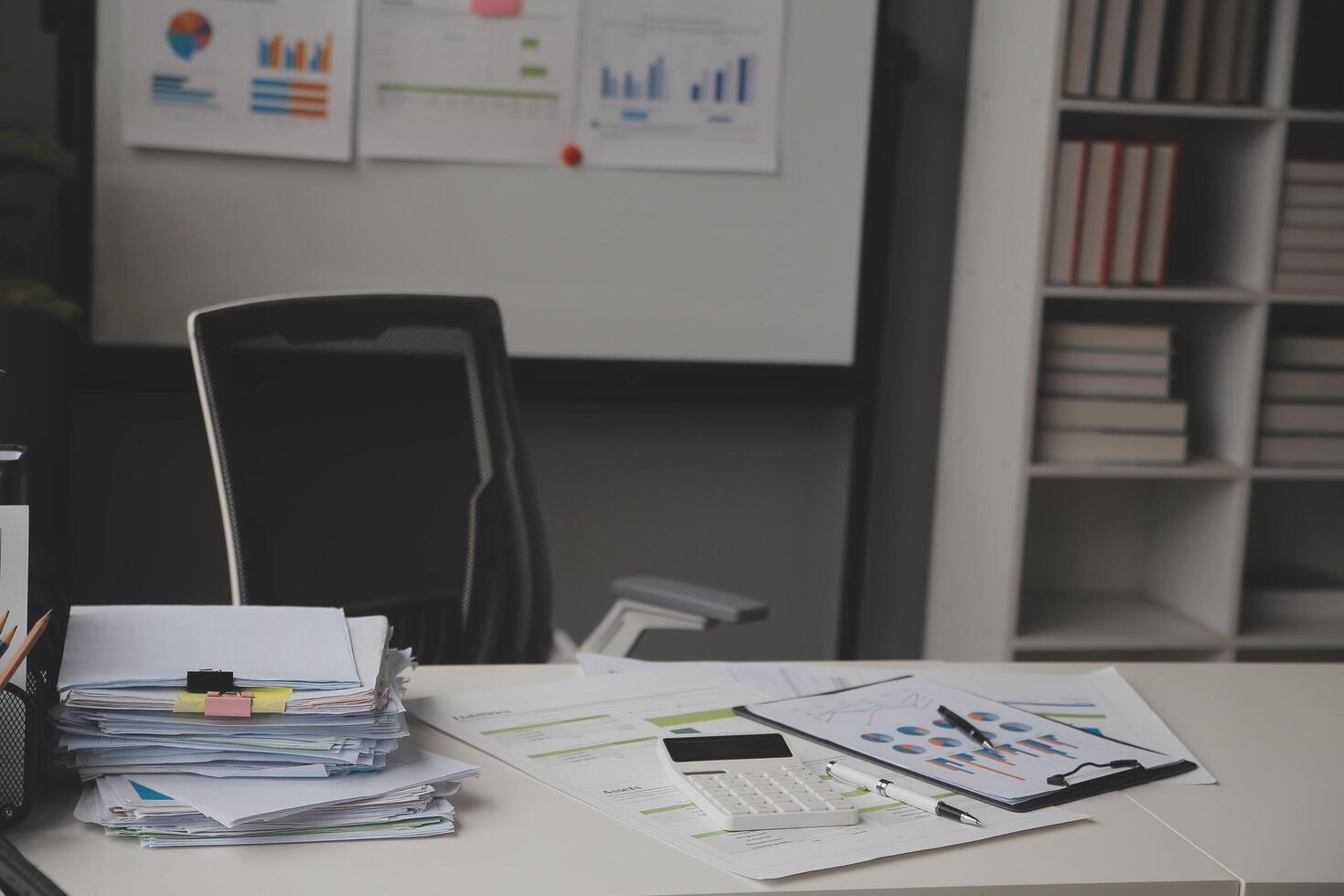 Team of business people working together in the meeting room office, teamwork background charts and graphs banner, double exposure successful teamwork,business planning concept. photo
