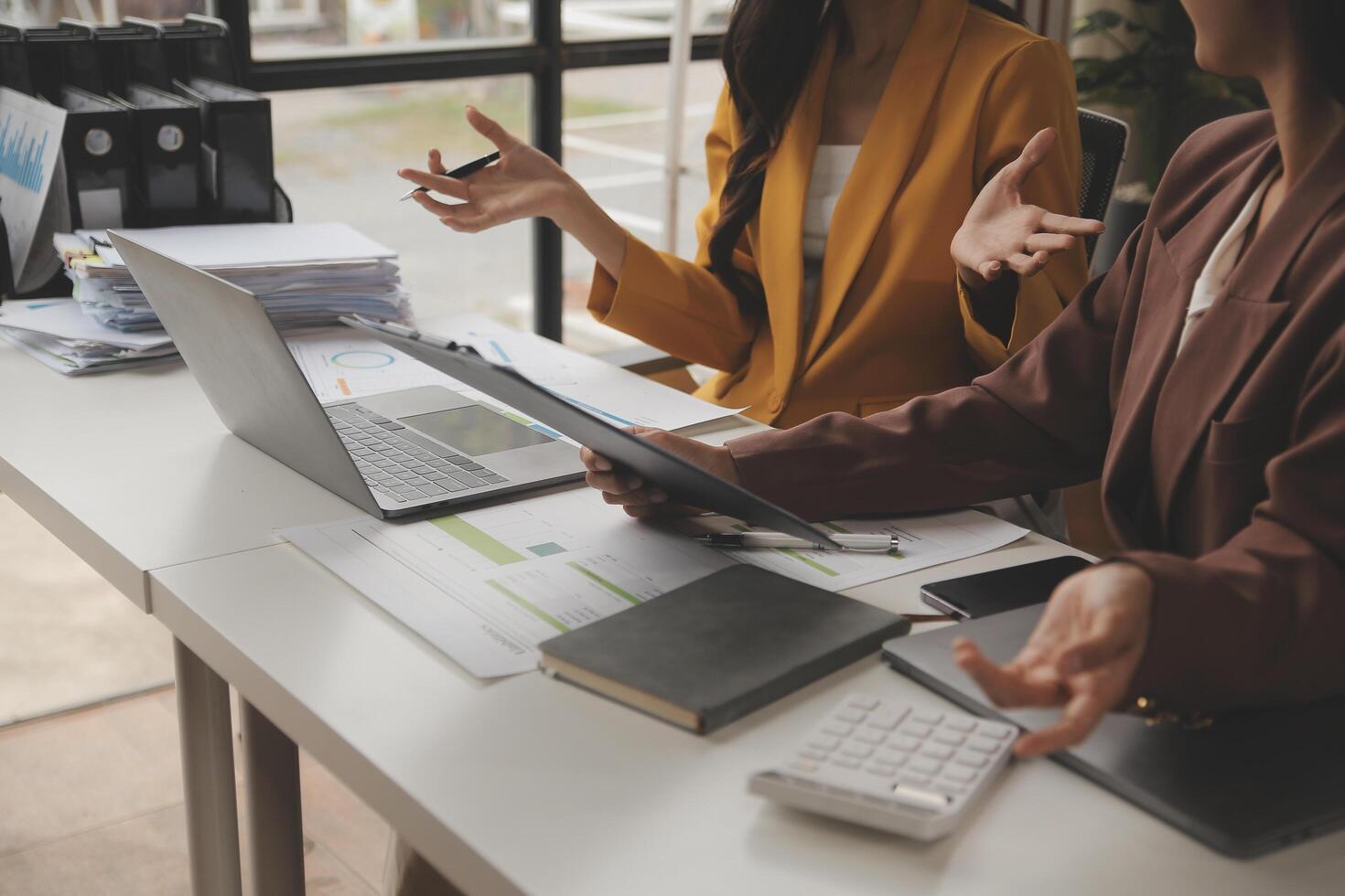 Team of business people working together in the meeting room office, teamwork background charts and graphs banner, double exposure successful teamwork,business planning concept. photo