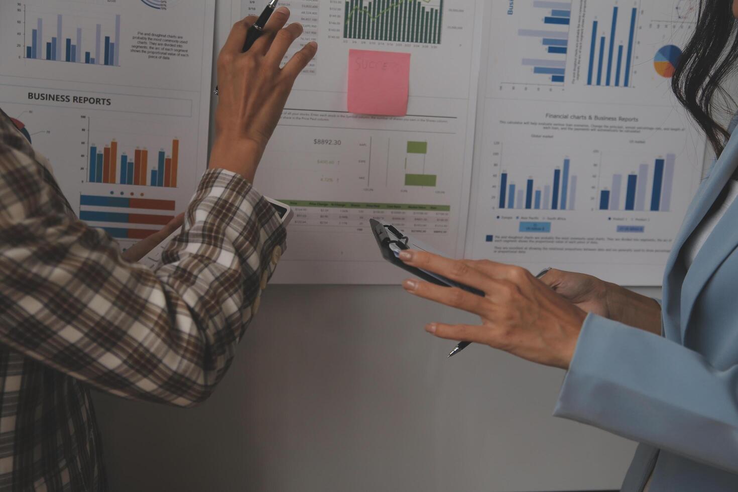 Team of business people working together in the meeting room office, teamwork background charts and graphs banner, double exposure successful teamwork,business planning concept. photo
