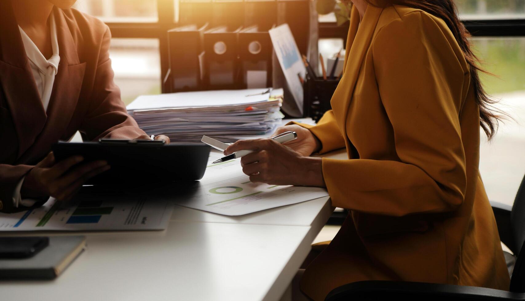 Team of business people working together in the meeting room office, teamwork background charts and graphs banner, double exposure successful teamwork,business planning concept. photo