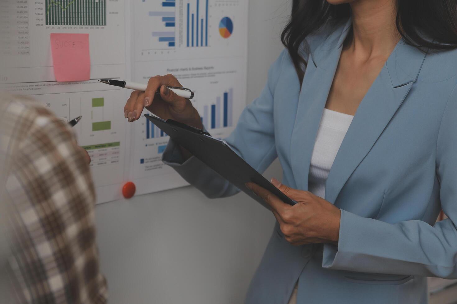 Team of business people working together in the meeting room office, teamwork background charts and graphs banner, double exposure successful teamwork,business planning concept. photo