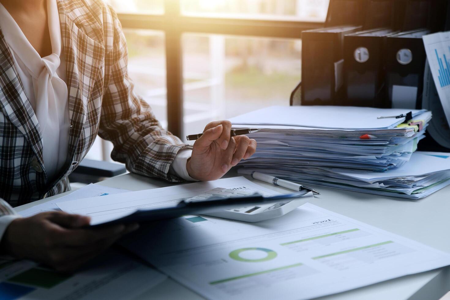 Team of business people working together in the meeting room office, teamwork background charts and graphs banner, double exposure successful teamwork,business planning concept. photo