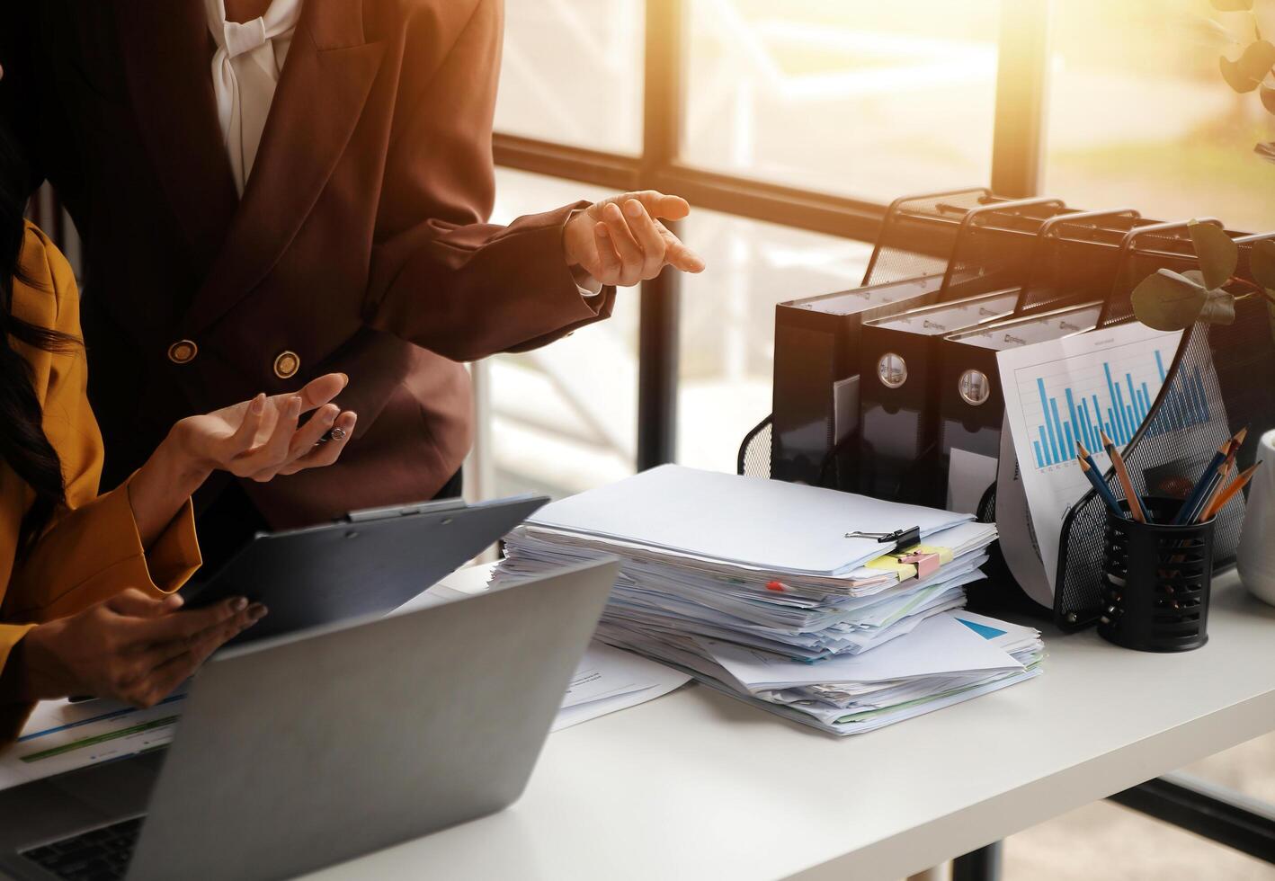Team of business people working together in the meeting room office, teamwork background charts and graphs banner, double exposure successful teamwork,business planning concept. photo