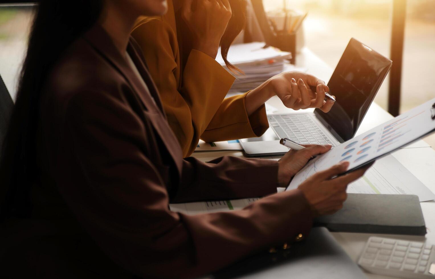 Team of business people working together in the meeting room office, teamwork background charts and graphs banner, double exposure successful teamwork,business planning concept. photo
