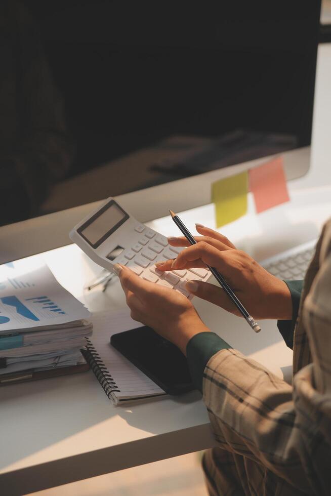 Team of business people working together in the meeting room office, teamwork background charts and graphs banner, double exposure successful teamwork,business planning concept. photo