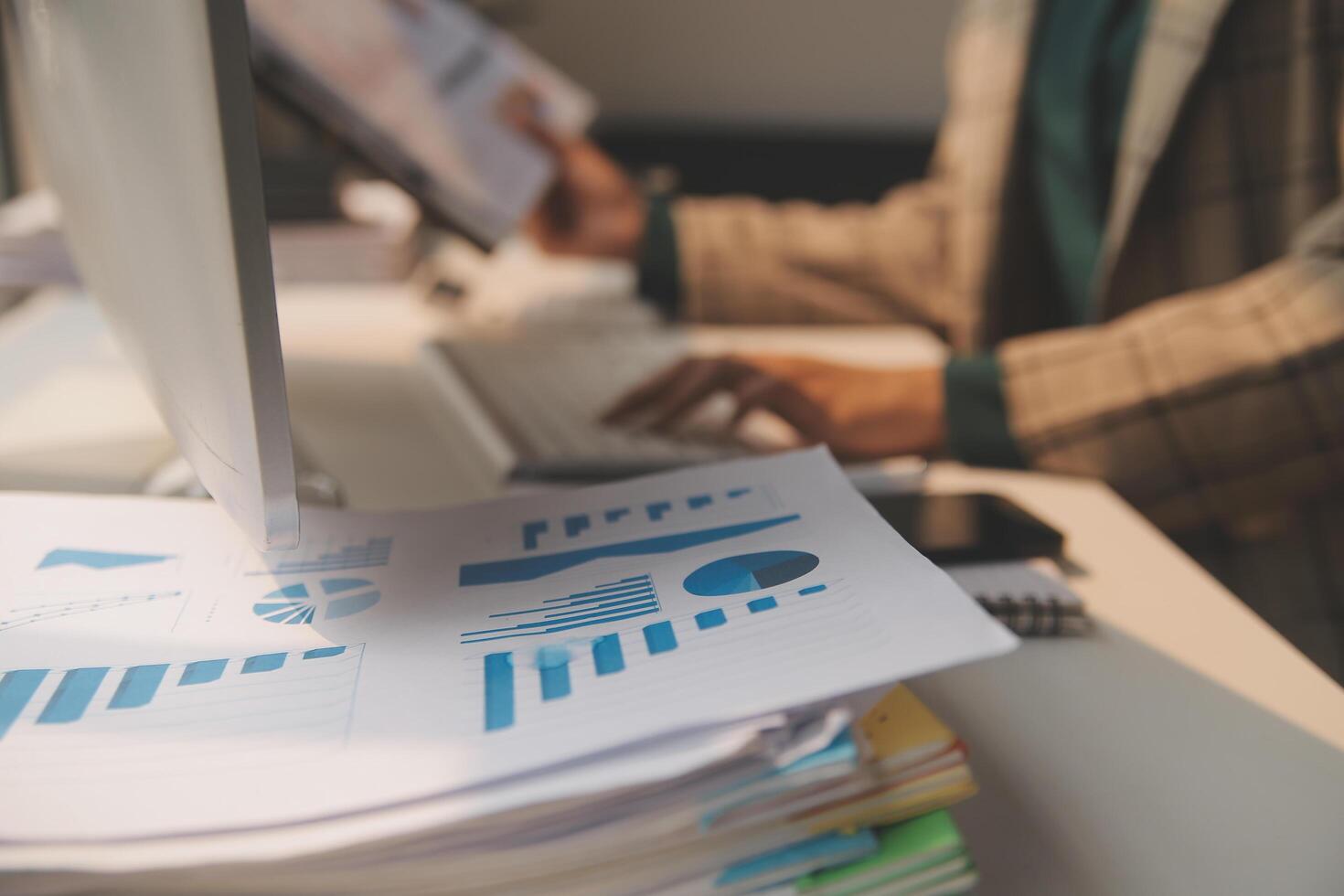Team of business people working together in the meeting room office, teamwork background charts and graphs banner, double exposure successful teamwork,business planning concept. photo