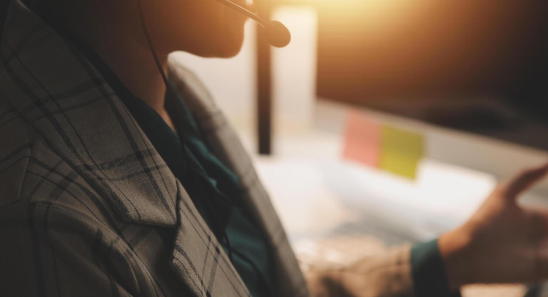 Call center, computer and business with woman in office for customer service, technical support and advice. Technology, contact us and communication with employee operator in help desk agency photo