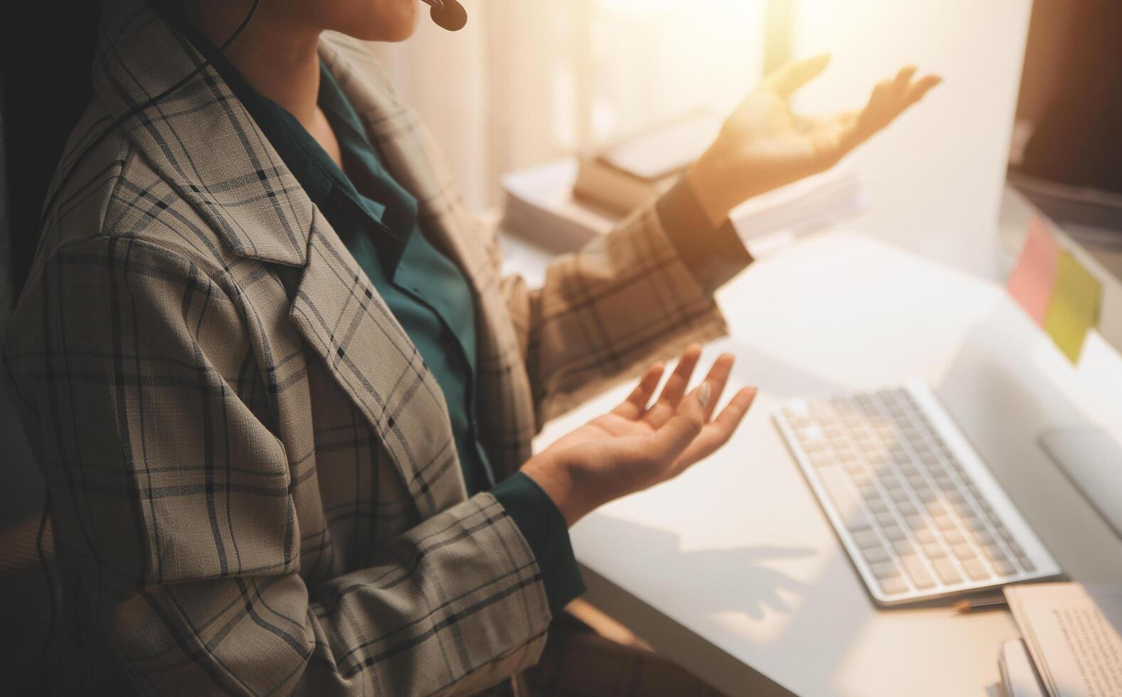 Call center, computer and business with woman in office for customer service, technical support and advice. Technology, contact us and communication with employee operator in help desk agency photo