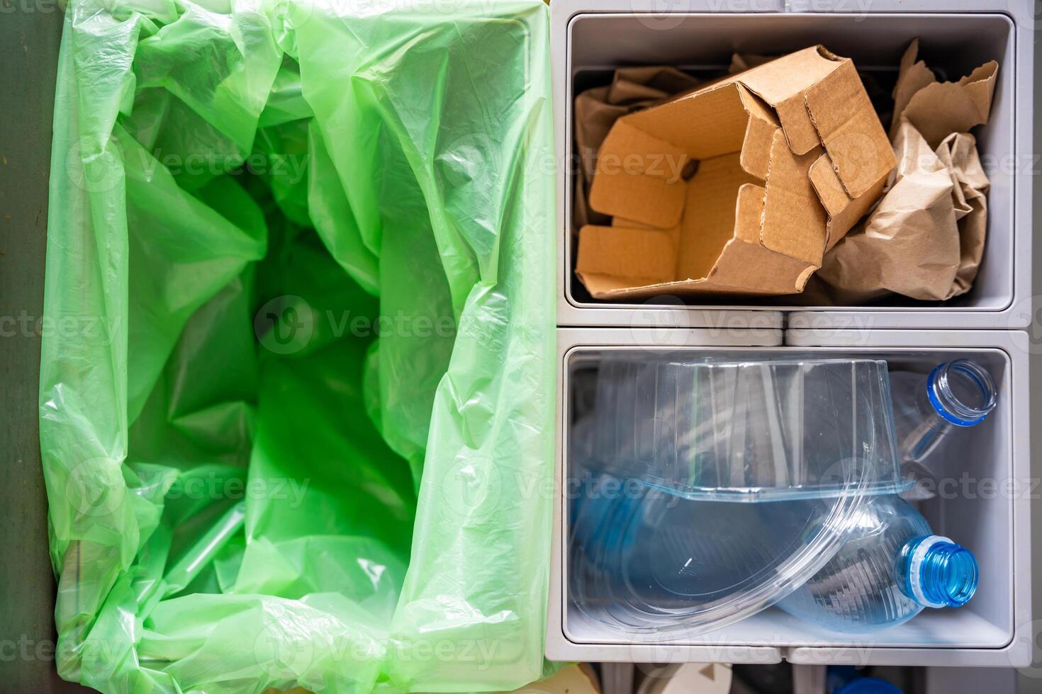Household bins for waste sorting in the kitchen for recycle. Plastic, paper, bio and mixed waste. Sorting waste at home concept. High quality photo