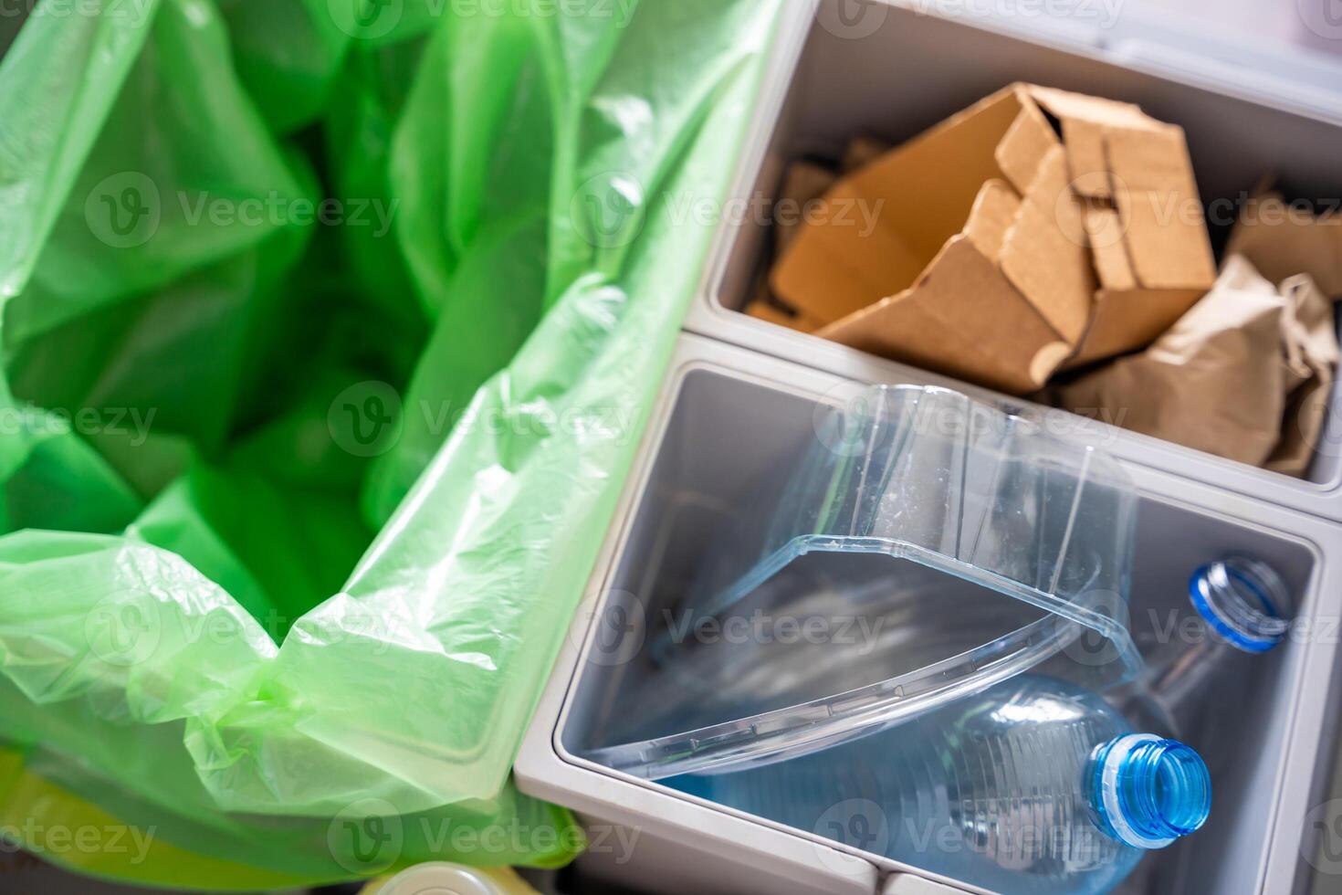 Household bins for waste sorting in the kitchen for recycle. Plastic, paper, bio and mixed waste. Sorting waste at home concept. High quality photo