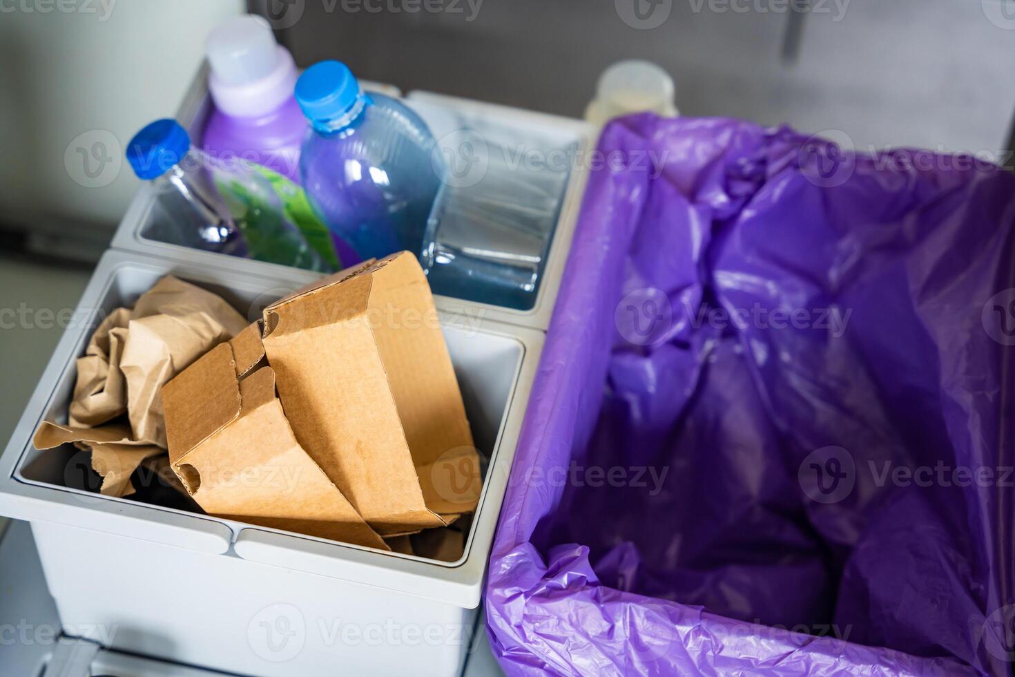 Household bins for waste sorting in the kitchen for recycle. Plastic, paper, bio and mixed waste. Sorting waste at home concept. High quality photo