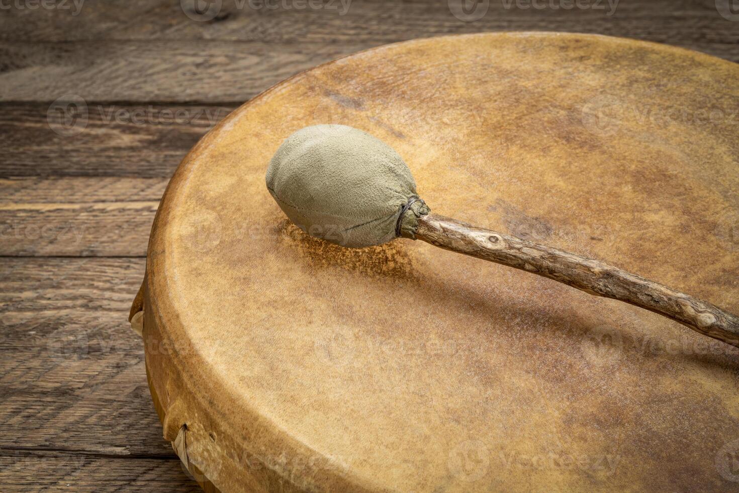 shaman frame drum with a beater photo