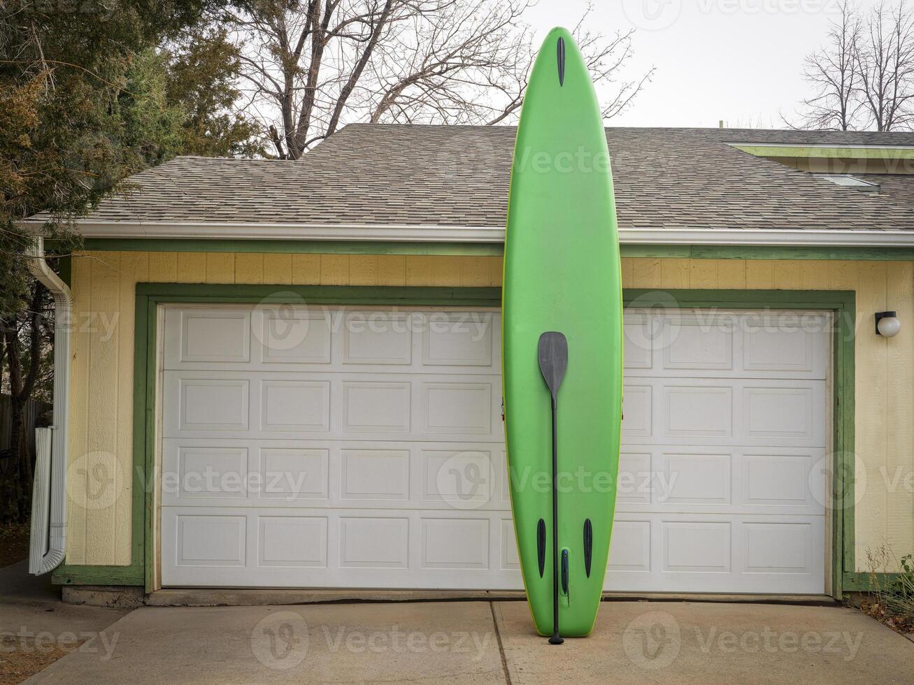 inflatable stand up paddleboard with paddle photo