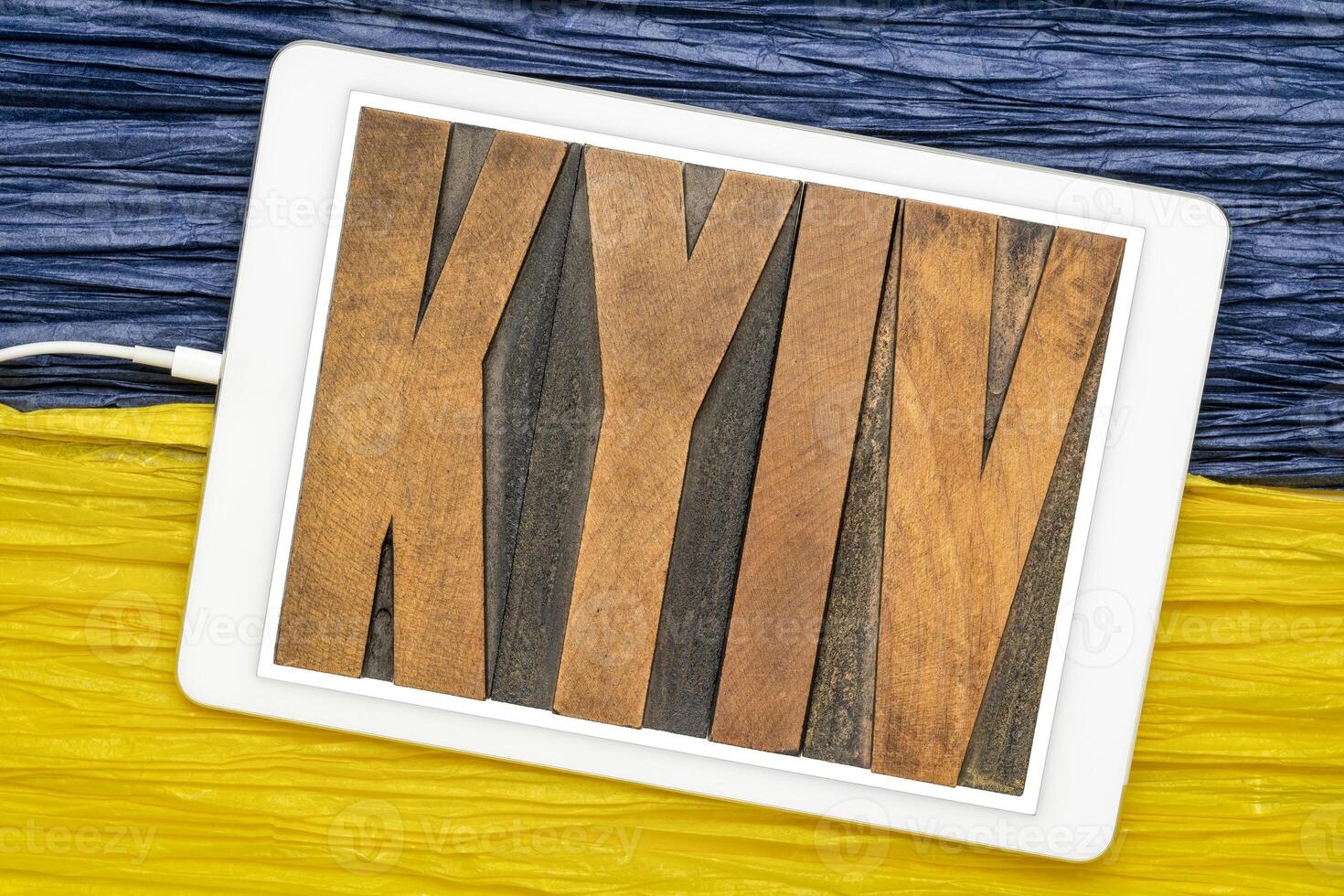 Kyiv word abstract in wood type photo