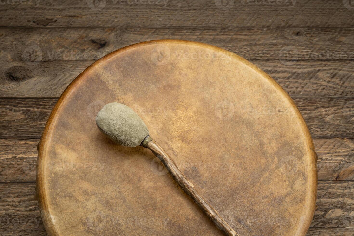 shaman frame drum with a beater photo