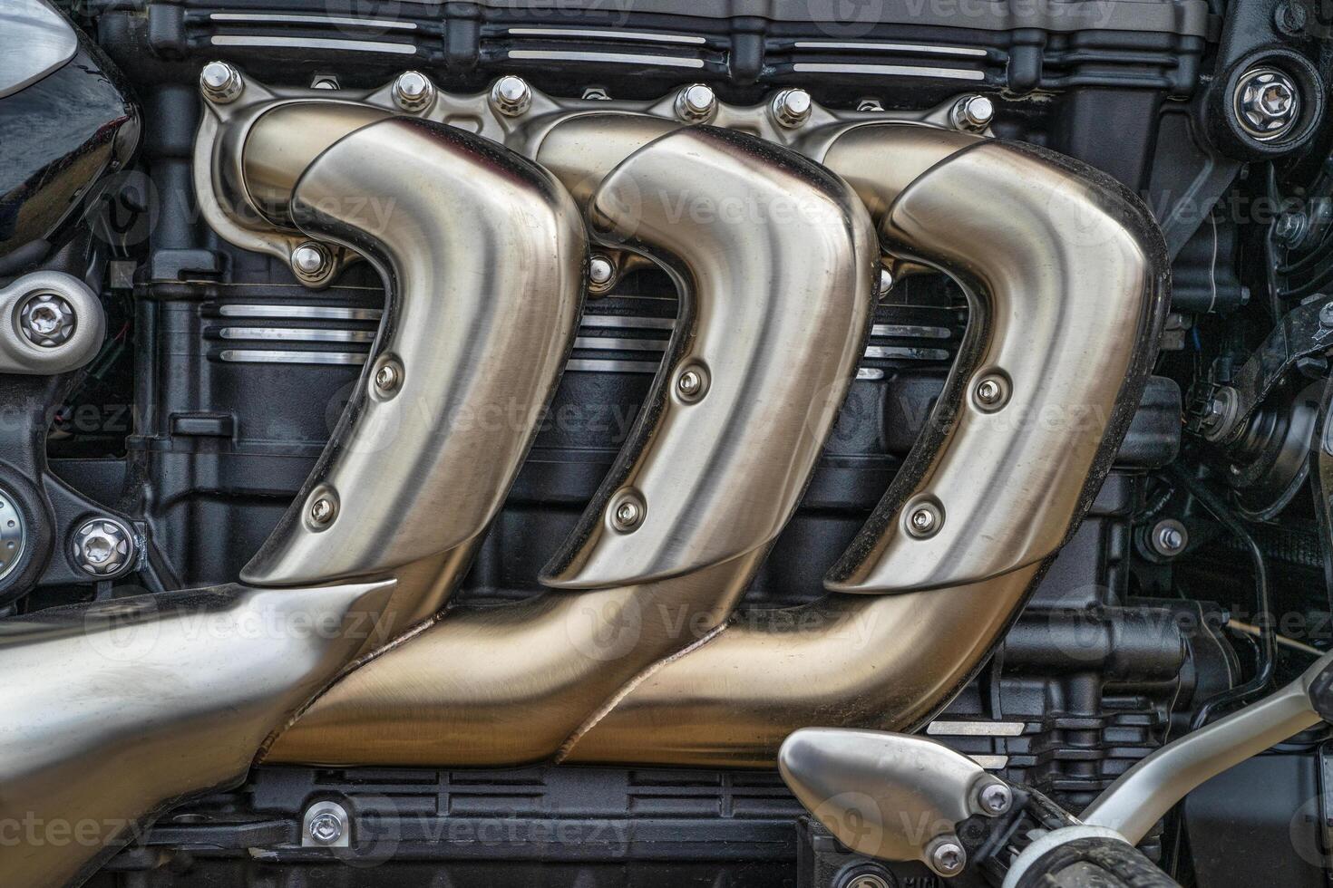 detail of triple engine motorcycle photo