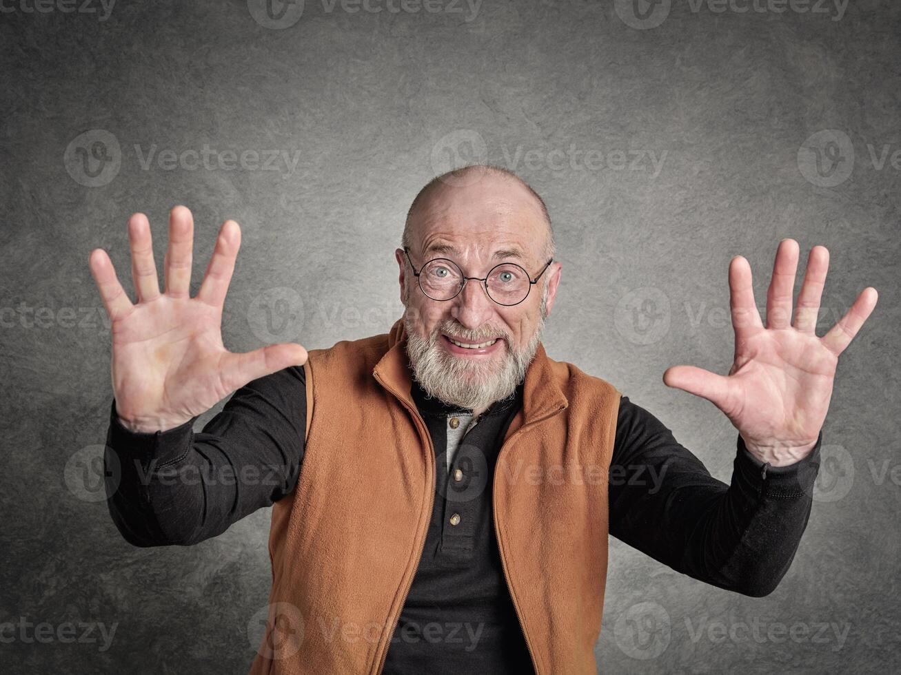 portrait of surprised and scared senior man photo