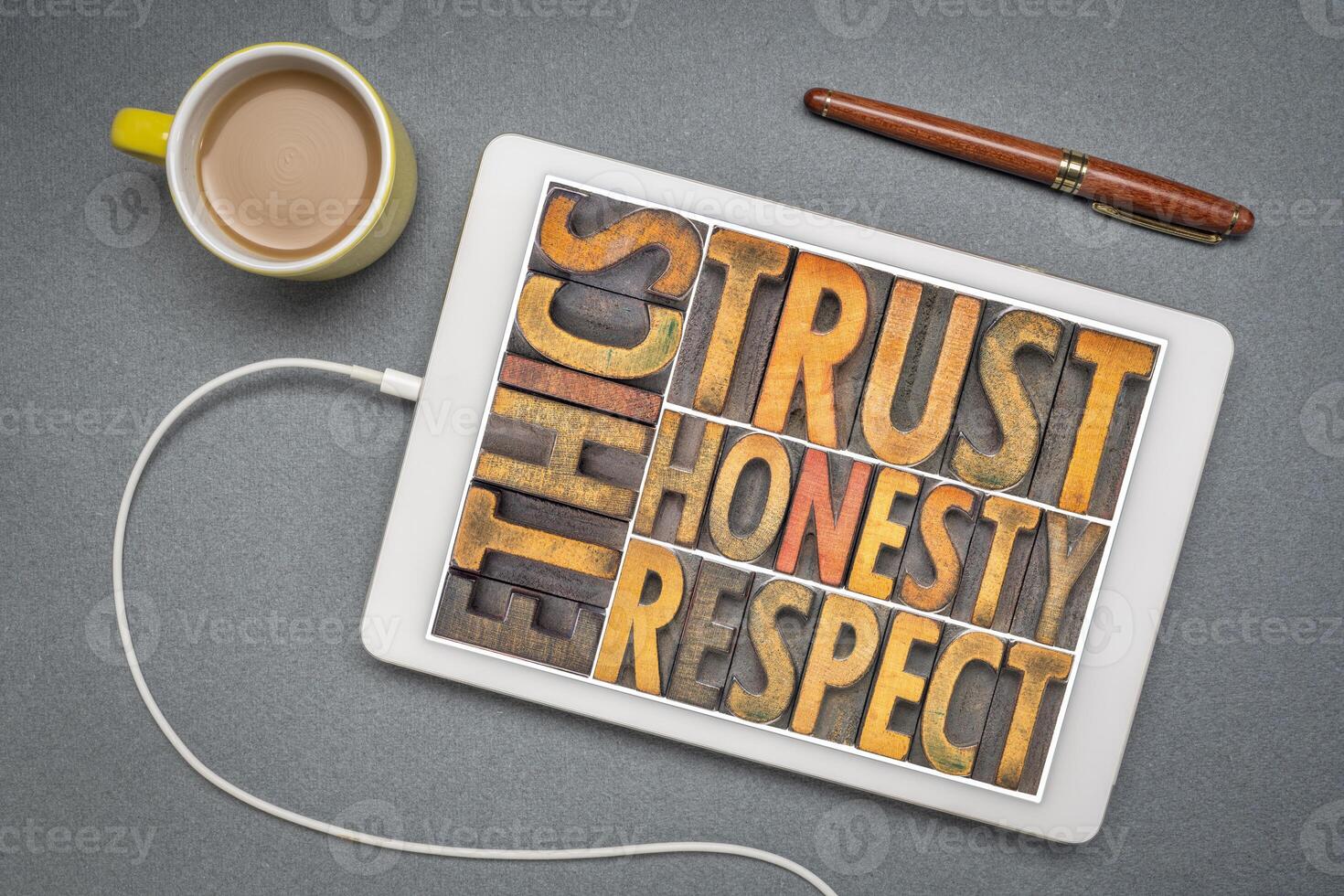 ethics, trust, honesty, respect word abstract in wood type photo