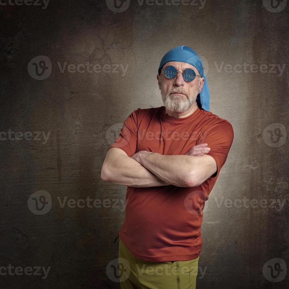 senior, handsome man with gray beard in skull cap photo