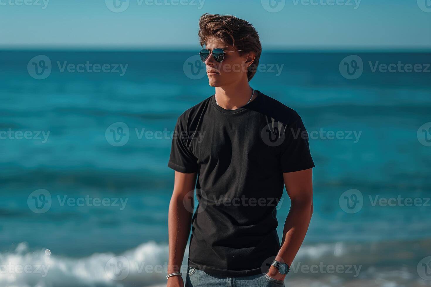 a man in a black T-shirt, front mockup of male black polo shirt sea background photo