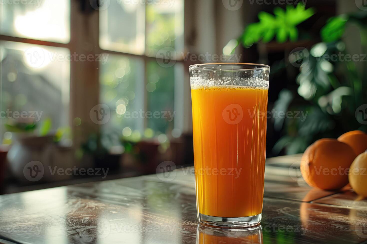 orange fresh juice on kitchen top photo
