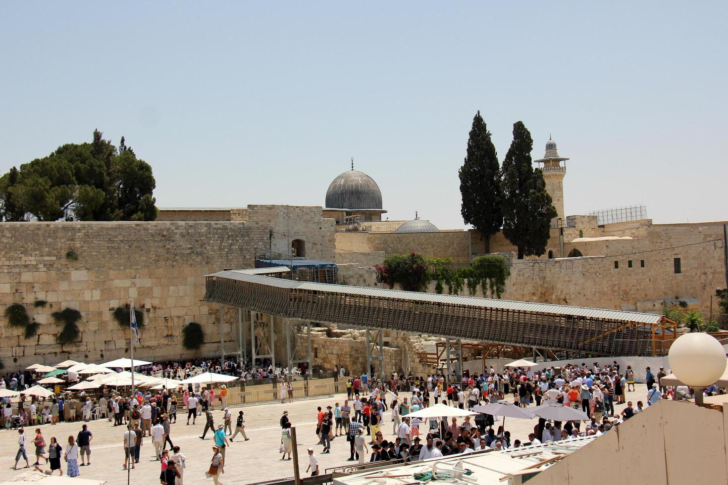 07 13 2023 Jerusalem Israel. The Western Wall is part of the ancient wall around the western slope of the Temple Mount in the Old City of Jerusalem. photo