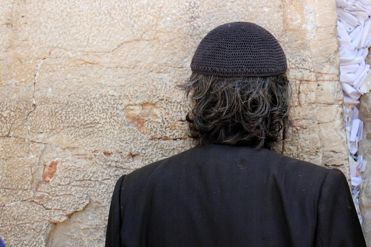 07 13 2023 Jerusalem Israel. The Western Wall is part of the ancient wall around the western slope of the Temple Mount in the Old City of Jerusalem. photo