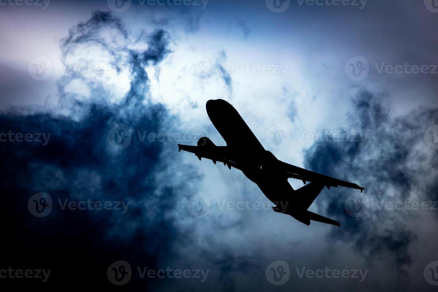 Untitled passenger plane at airport. Aviation industry and aircraft. Air transport and flight travel. International transportation. Fly and flying. Silhouette. photo