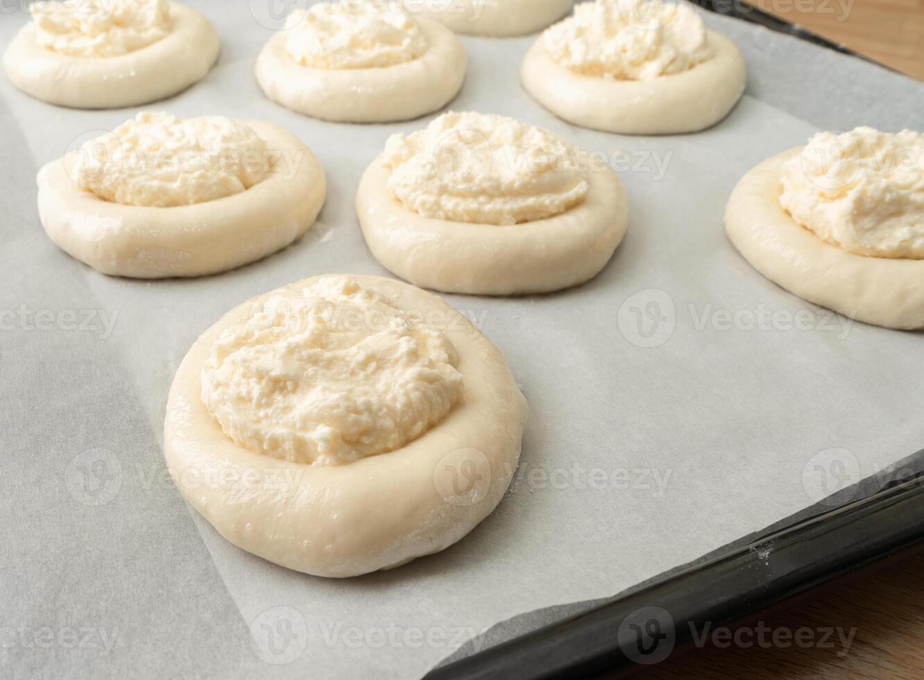 ring of dough with quark in the middle. baking at home, Ball dough with cottage cheese photo
