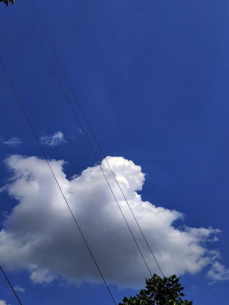 white clouds in the blue sky. photo