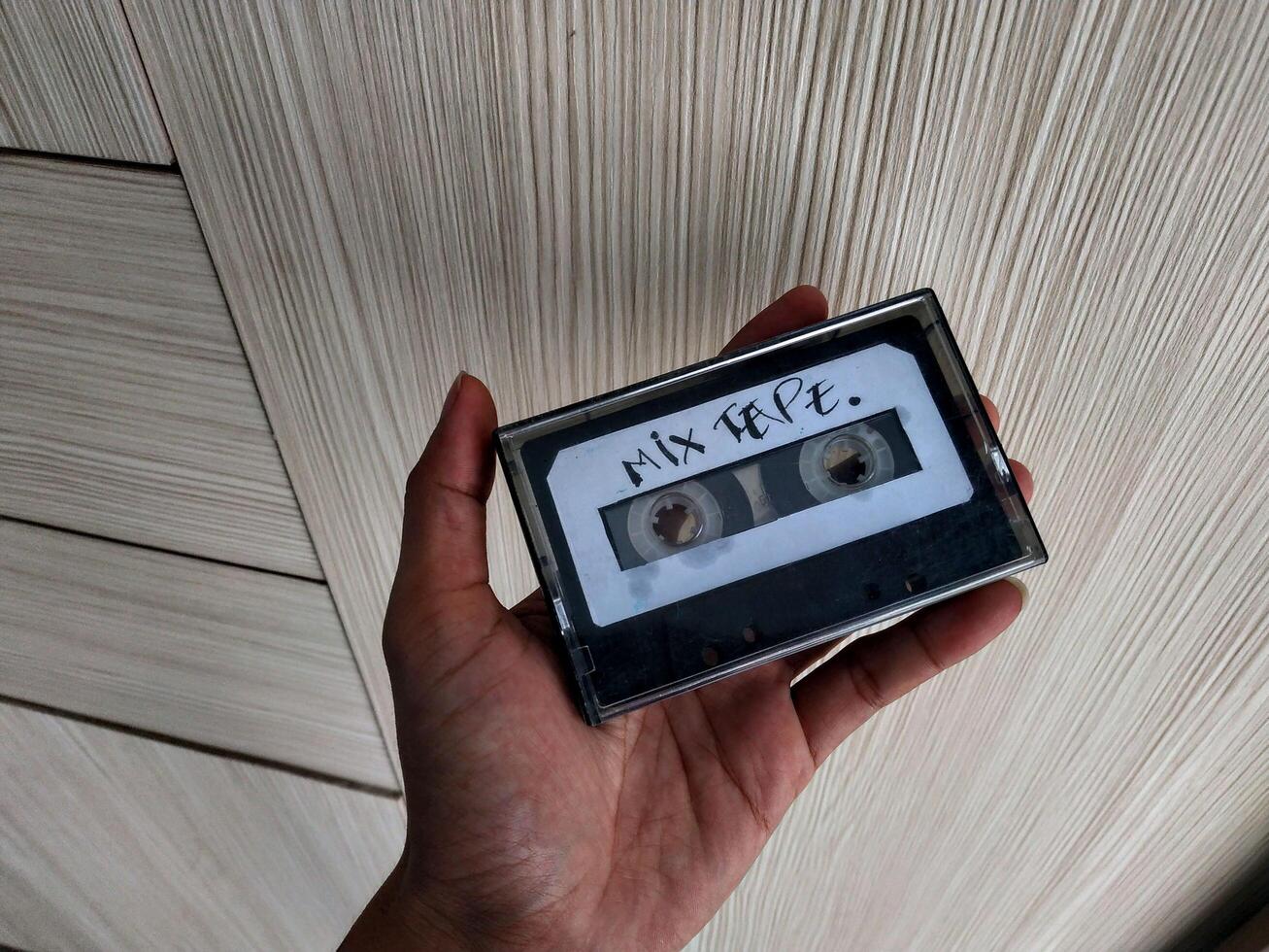 Hand held tape cassette mixtape photo