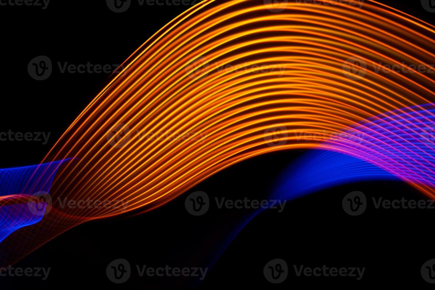 Abstract technology banner design. Long exposure, light painting. Vibrant streaks of digital neon lines on black background. photo