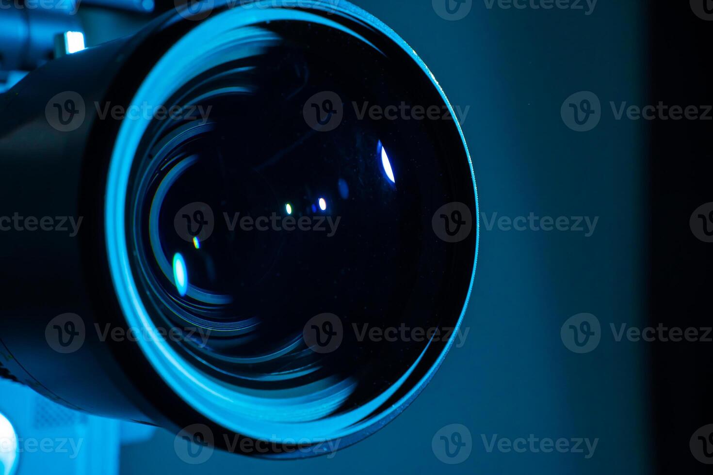 Close-up of a digital camera lens with dark light. Copy space for text. photo