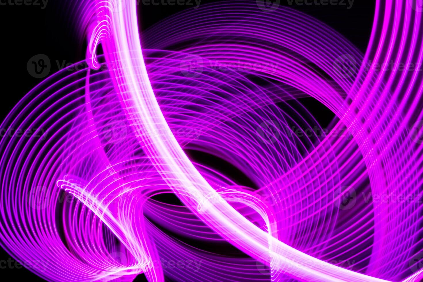 Abstract neon metallic pink curvy lines on black background. Technology data. photo
