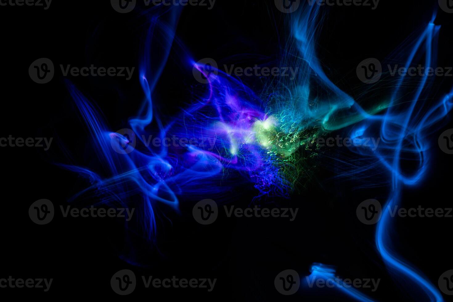 Blue and green light explosion of energy with elegant glowing lines. Abstract technology background. photo