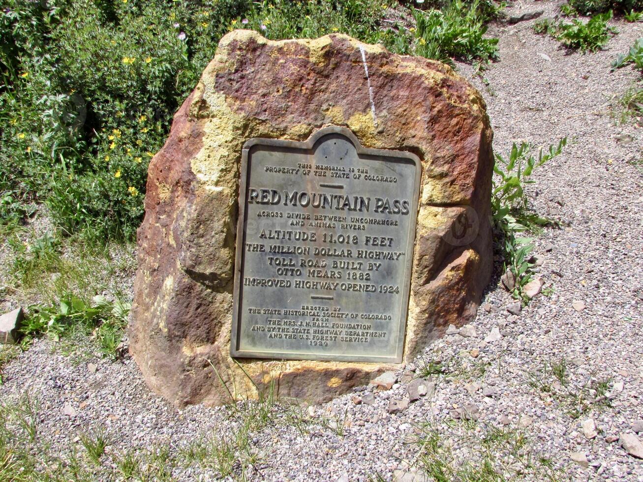 Red Mountain Pass Elevation 11018 ft Sign on Rock in Colorado photo