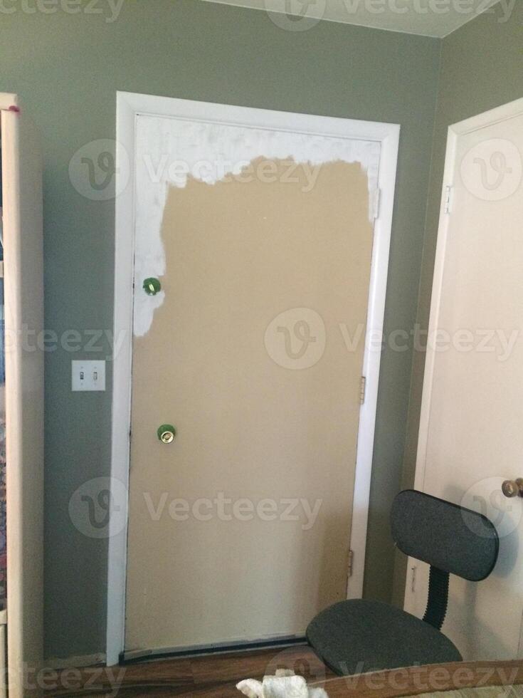 Painting a Front Door During Home Renovation photo
