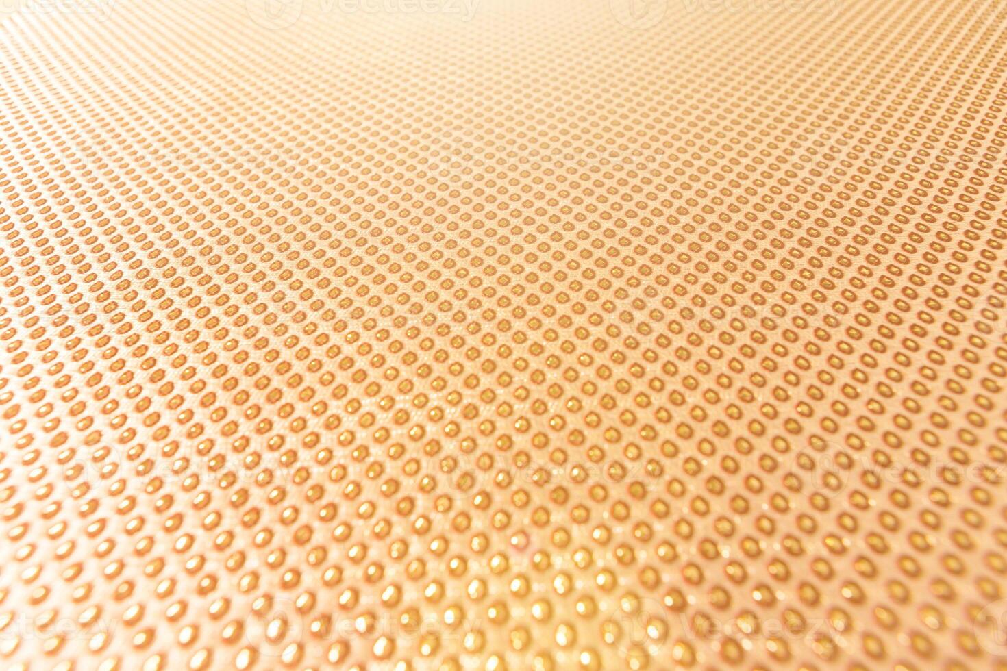 texture of the fabric, side, background of fabric in the highlight. golden color photo