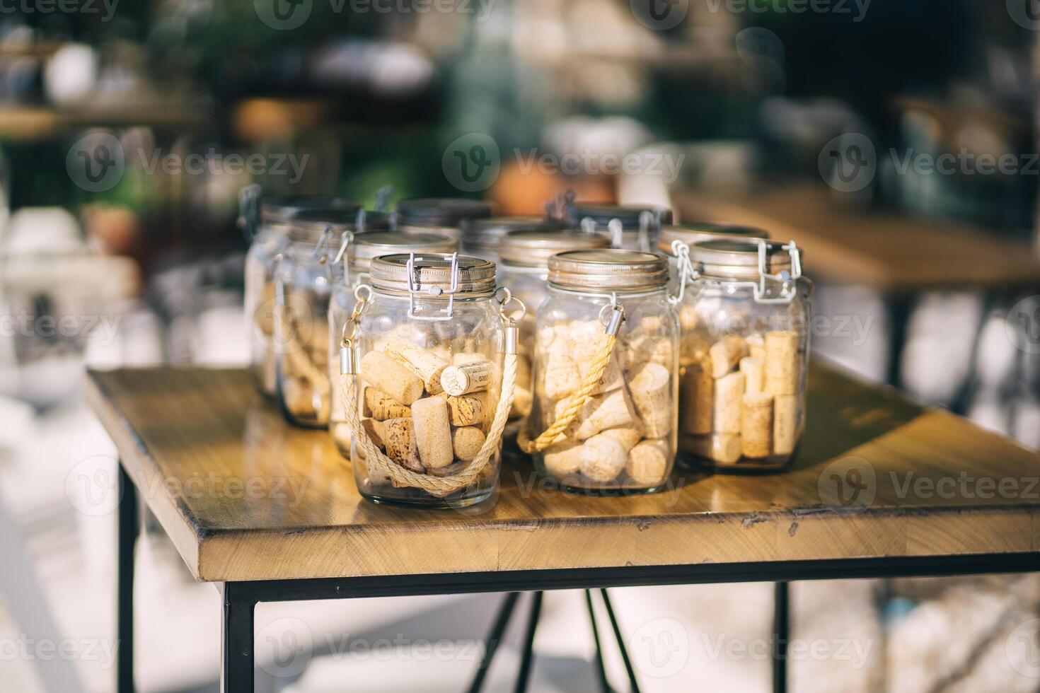 Vintage jars with corks from wine inside photo