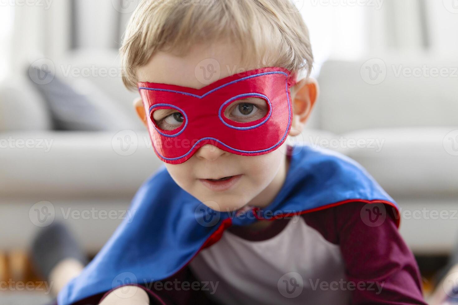 Toddler Boy with Superhero Mask and Cape photo