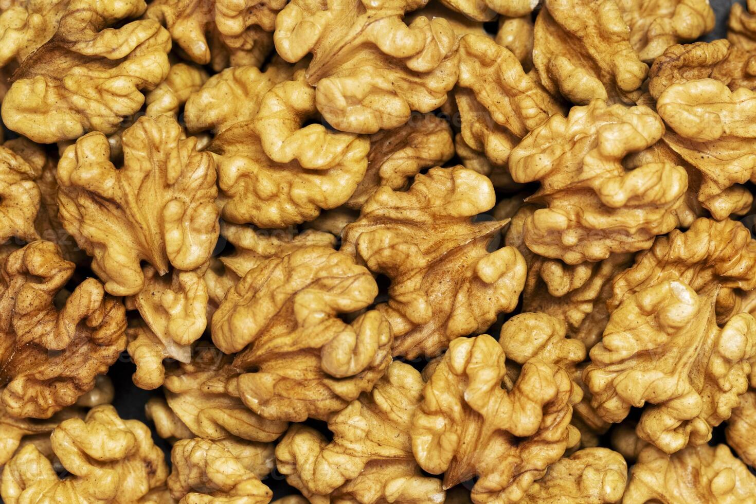 Walnuts background. Kernels walnuts. Top view. Vegetarian or healthy food photo