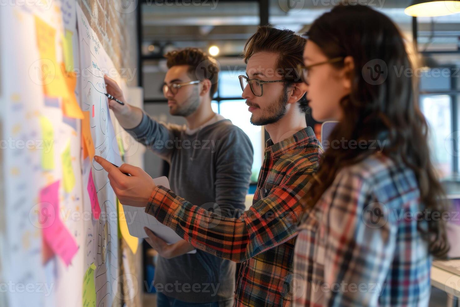 Innovative Tech Startup Team Brainstorming During Design Sprint in Creative Workspace photo