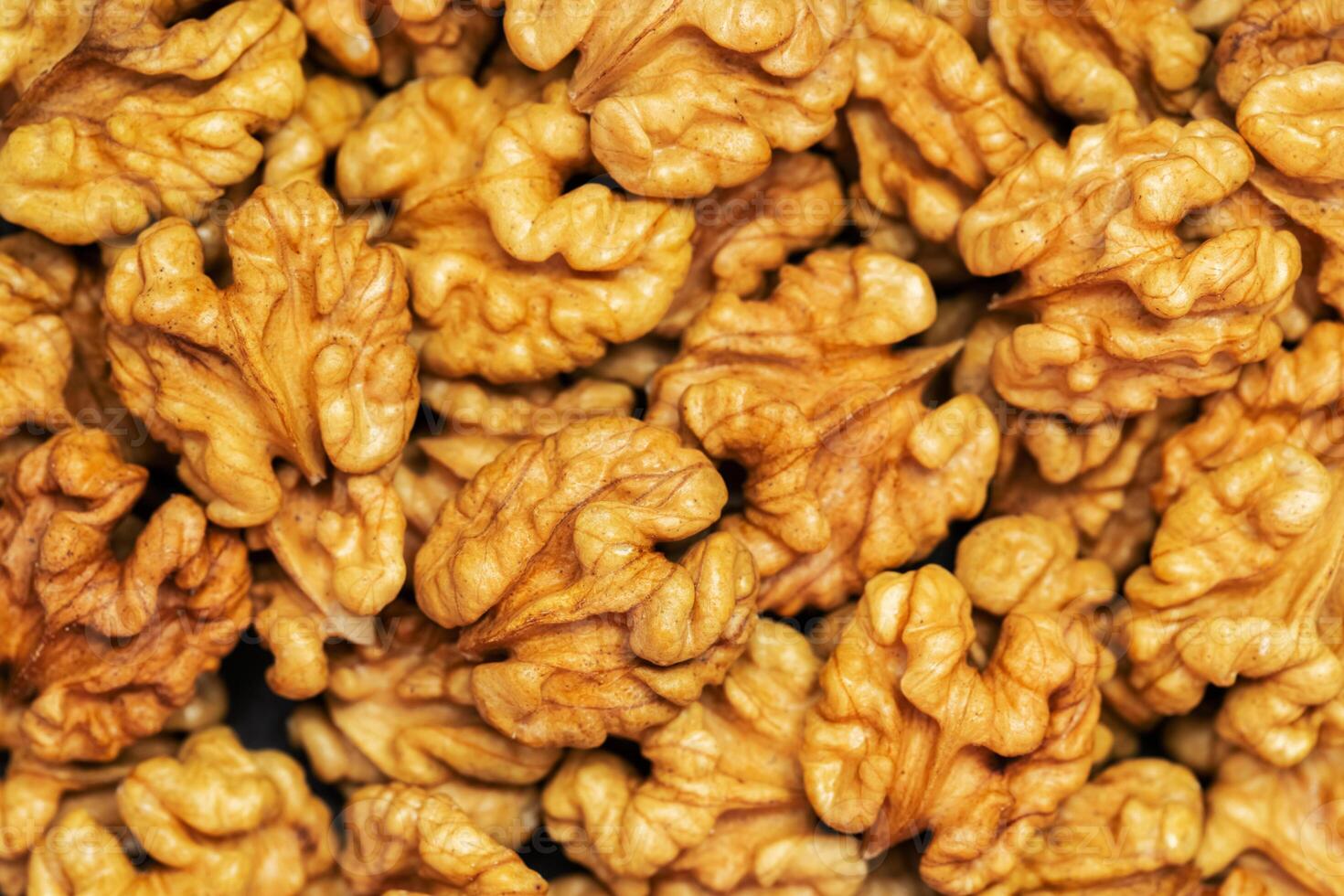 Walnuts background. Kernels walnuts. Top view. Vegetarian or healthy food photo